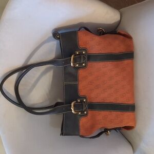 Dooney signature tote with leather trim very good condition